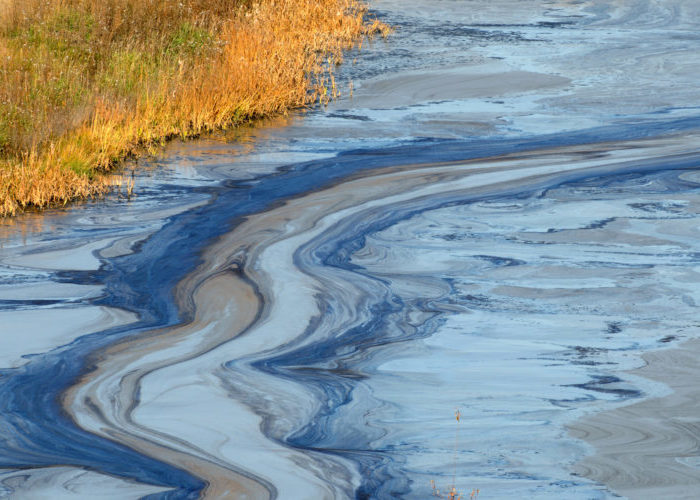 Oil slick in coast water