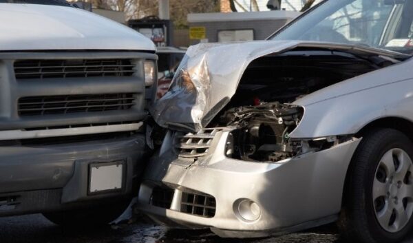 collision between small car and van PI