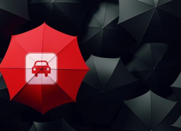 Red umbrella with Car Icon on It surrounded by black umbrellas MAIN